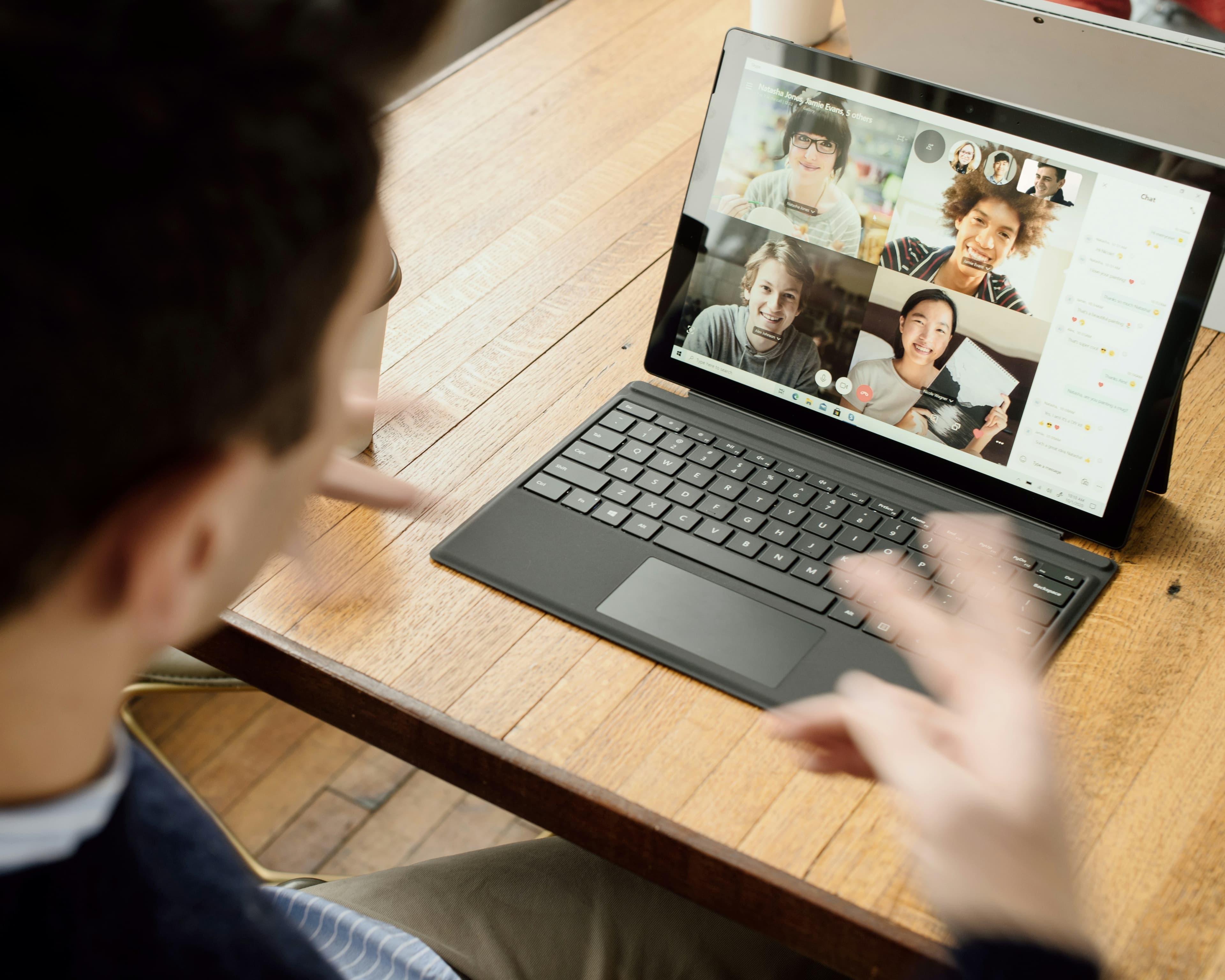 A person joining an online hearing by video call